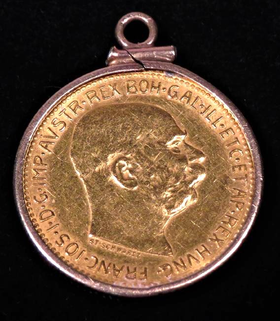 Rex 1915 Gold Coin Pendant: 1915 Rex Gold Coin, set in a bezel and with a bale so it can be worn as a pendant. Set in a 10k bezel.