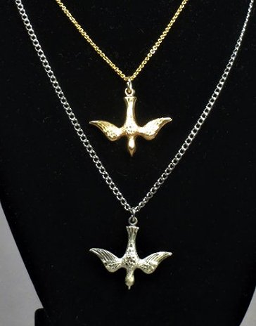 Pair Sterling & 14K Gold Bird Necklaces: Pretty necklace pair of bird necklaces. The gold bird is unmarked but tests 14K and is on a 14K chain measures approx 17" long, 9g (clasp is marked 10K). The silver bird is unmarked but tests for ster