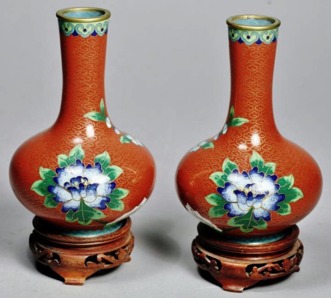 Pair Of Chinese Cloisonne Vases with Hardwood Stands: Pair of Chinese Cloisonne vases with hardwood stands. In very good condition. No apparent chips or cracks in the vases or stand. Without stands vases are 5.25 inches high. With stands about six inches