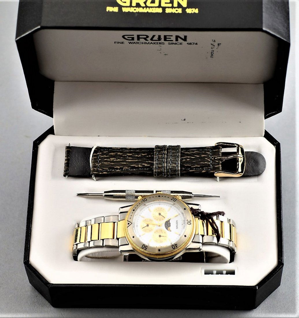 Gruen Two Toned Watch: Gruen Two Toned Watch, appears to be unused in the original box. Comes with an extra strap to convert the band. Untested