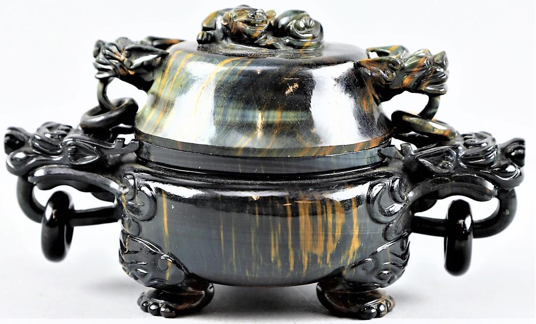 Stunning Carved Chinese Tiger Eye Censer: Here is a stunning piece! Both the top and bottom are carved from 1 piece of tiger eye gemstone, including the eyelet rings that are affixed. Pattern is a urn shape with 3 feet supporting a squat bulb