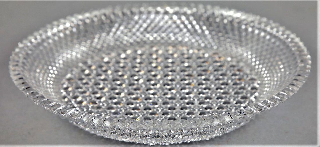 Fantastic American Brilliant Cut Crystal Dish.: Fantastic and very highly cut crystal dish. The cutting on this dish is deep and sharp. No visible makers mark. Overall in very good condition. Two chips on the outer rim teeth, and a couple of fleabi