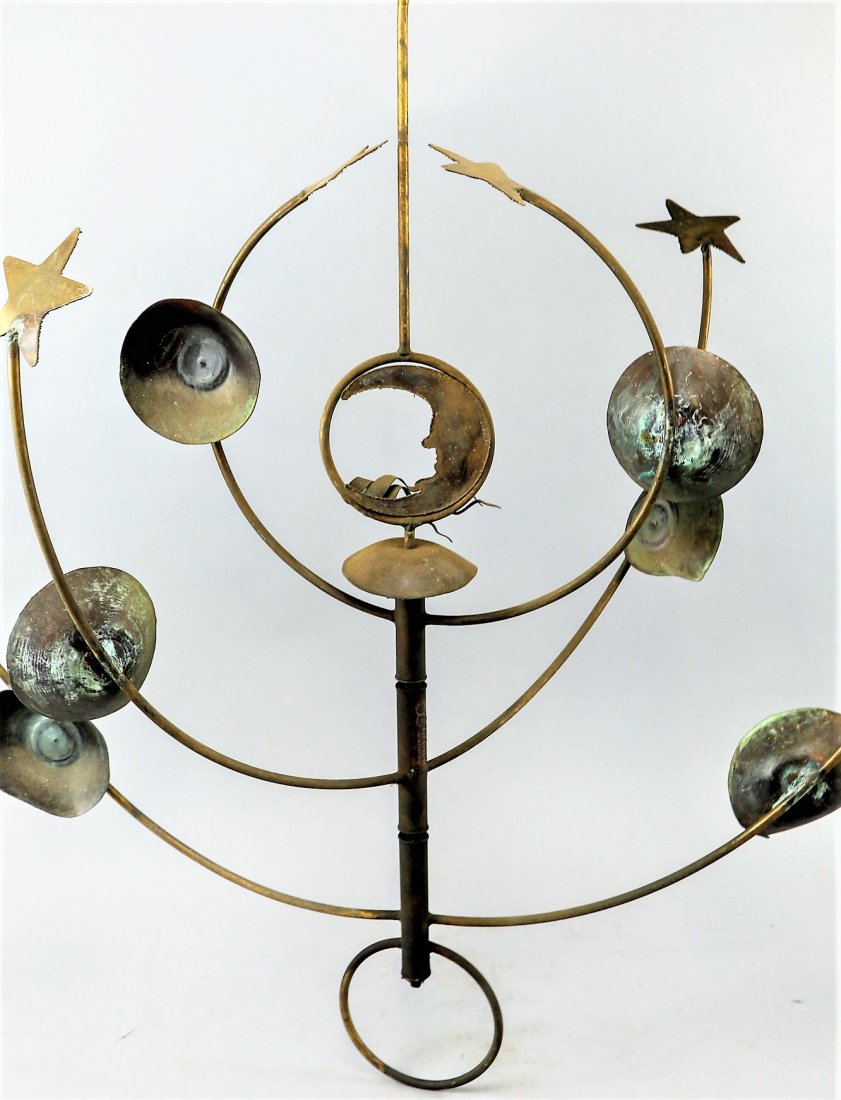Mid Century Mobile Lee Coulter: Designer by Lee Coulter Clearly marked with monogram and name and also Pat. No. DES 342695.Appears to be copper with some nice . Some dents to the disk, the piece definitely hung outdoors. 31 inches i