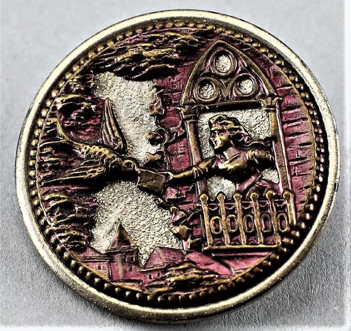 c1880 Brass & Steel Love Letter Button: Darling button of brass over steel button. Button is known as Love Letter and depicts a woman handing a letter to a bird. The brass is tinted in a pretty purple that shows very little wear. Retains or