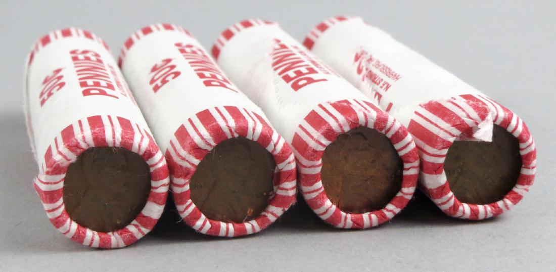 4 rolls of what appears to be Wheat Pennies: 4 rolls of what appears to be Wheat Pennies. Appears bank rolled. What are showing appears to be a 1941 S, Steel Penny, 1944, and also 194?.