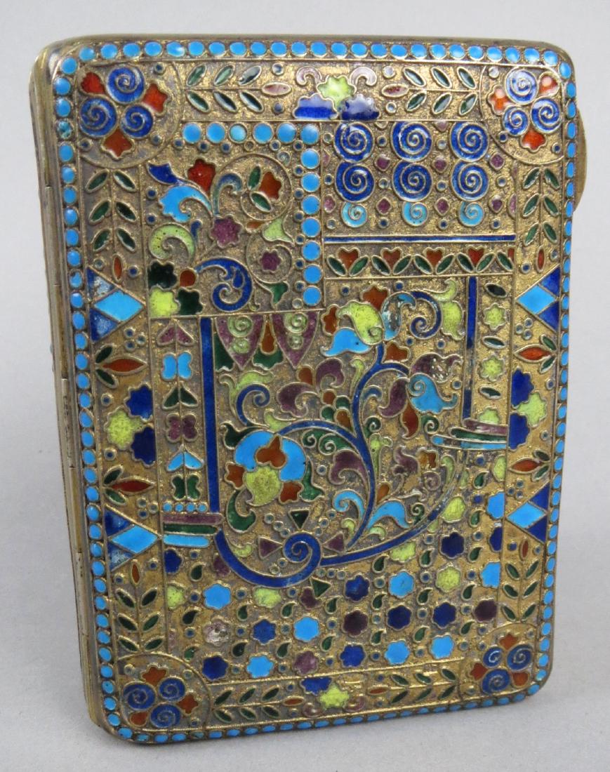 Antique Russian Champleve over Brass Cigarette Case: Gorgeous cigarette box in what appears to be champleve over brass. It appears to be of Russian origin, but could be Persian. The outide pattern is a mix of flowers, butferflies, leaves, swirls and mor