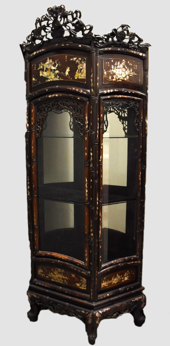 Antique Rosewood & Mother of Pearl Chinese Cabinet: This cabinet has incredible details throughout starting with the crown of the piece having five bats and coins. Three of the bats are biting the coins, two are biting what appear to be some sort of fl
