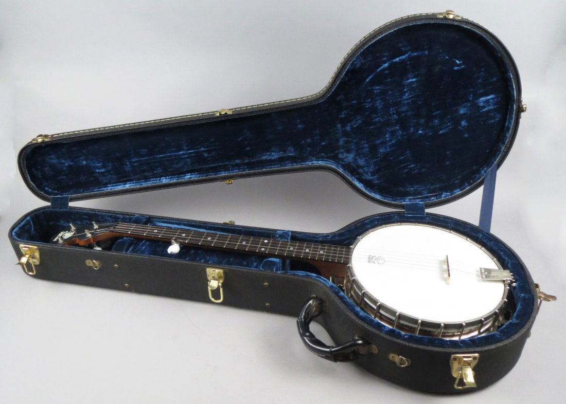 NEW Deering "Sierra" 5 string Banjo: The Deering "Sierra" 5 string Model Banjo made by The Deering Banjo Company of Spring Valley, California and is in a hard banjo case. Serial #12102394-3767. Comes with extra strings and all paperwork.