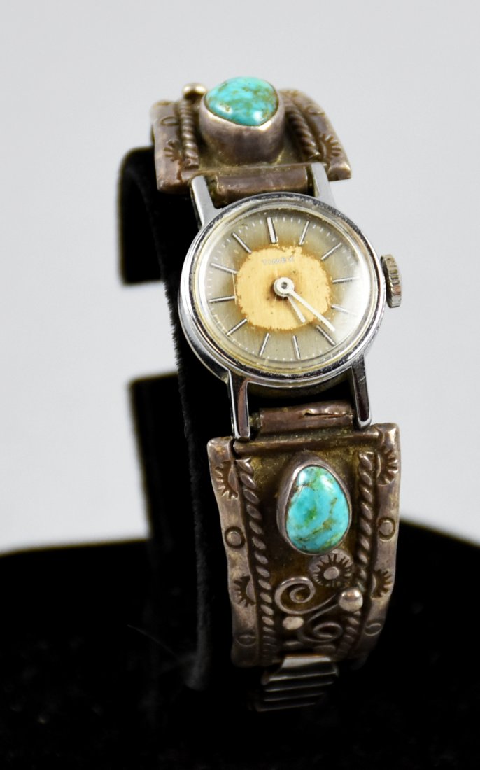 Vintage Watch Navajo Artist Kenny Jack Band Sterling: This cool watch band is by Navajo jewelry artist Kenny Jack. This band has turquoise stones with applied sterling details and stamped details. The watch is a Timex, but can be easily switched to a dif