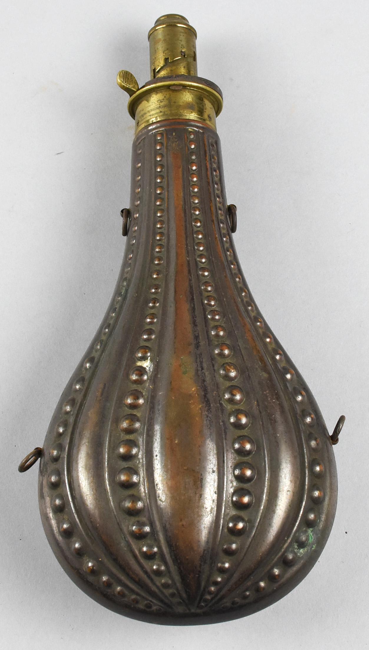Large Antique James Dixon & Son Brass & Copper Powder: A Good 19th Century James Dixon & Sons Sporting Powder Flask. Brass adjustable top, stamped - James Dixon & Sons, Sheffield - Body with Dixon Stamps. Overall length 11.5". No dents, seems good with st