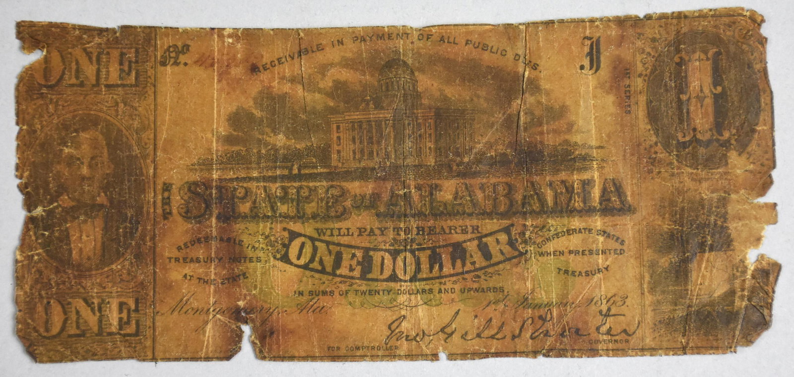 1863 Confederate Dollar Bill, State of Alabama: Very fragile dollar bill dated 1863 from the state of Alabama.
