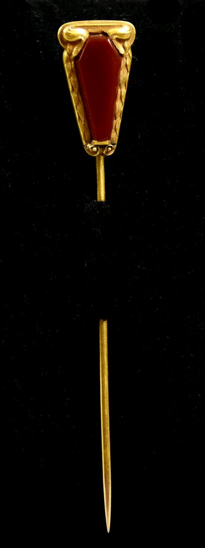 Antique 14K Gold/Carnelian Stick Pin: Lovely stick pin in 14K gold with a triangular carnelian stone. The back of the pin is marked 14 B, test 14k. Approx 2 1/2" long and approx weight 2.6g.