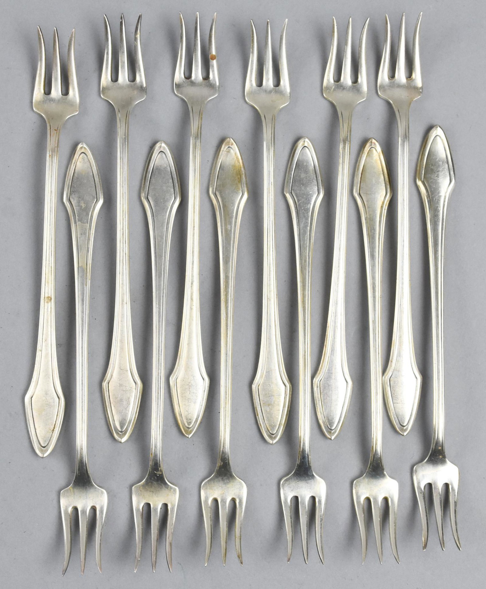 1916 Alvin Silver Plate Oyser Forks. Molly Stark: Very nice lot of oyster forks by Alvin in the pattern of Molly Stark. There are 12 forks in total, measuring approx 5 5/8" long.