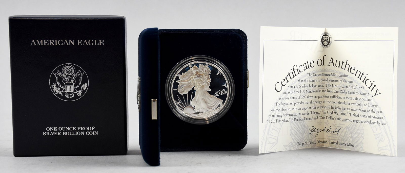 1998 P One Ounce Proof Silver Bullion American Eagle: 1998 P Silver American Eagle coin. 1 ounce Proof silver bullion that has been encased by the United States Mint and housed in a velvet lined case and accompanied by a Certificate of Authenticity.