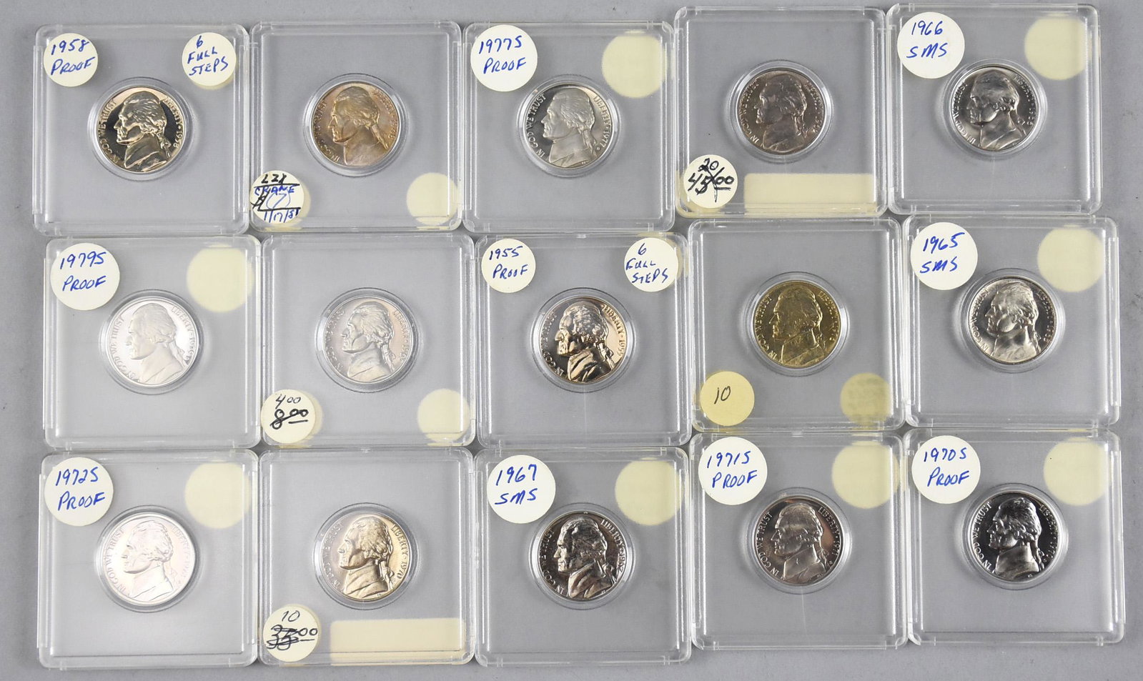 Lot of 15 Jefferson Nickels w/ Steps: Lot of 15 Jefferson Nickels that have been placed in hard plastic holders. The following dates are represented: 1948 D BU (5 full steps), 1955 (Proof, 6 full steps), 1958 (Proof, 6 full steps), 1962 D