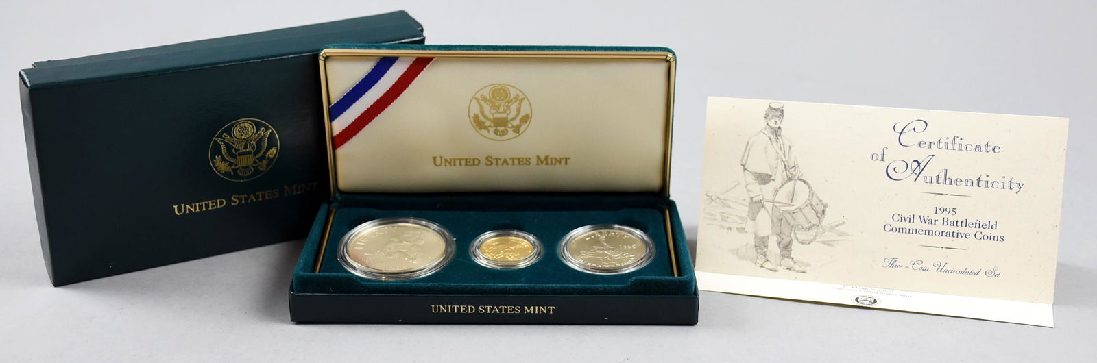 1995 Civil War Battlefield Commemorative Set US Mint: US Mint set contains a Gold $5 coin with a Civil War Bugler on Horseback on the obverse and an Eagle with a banner on the reverse. A Silver dollar showing a Civil War Soldier giving assistance to a wo