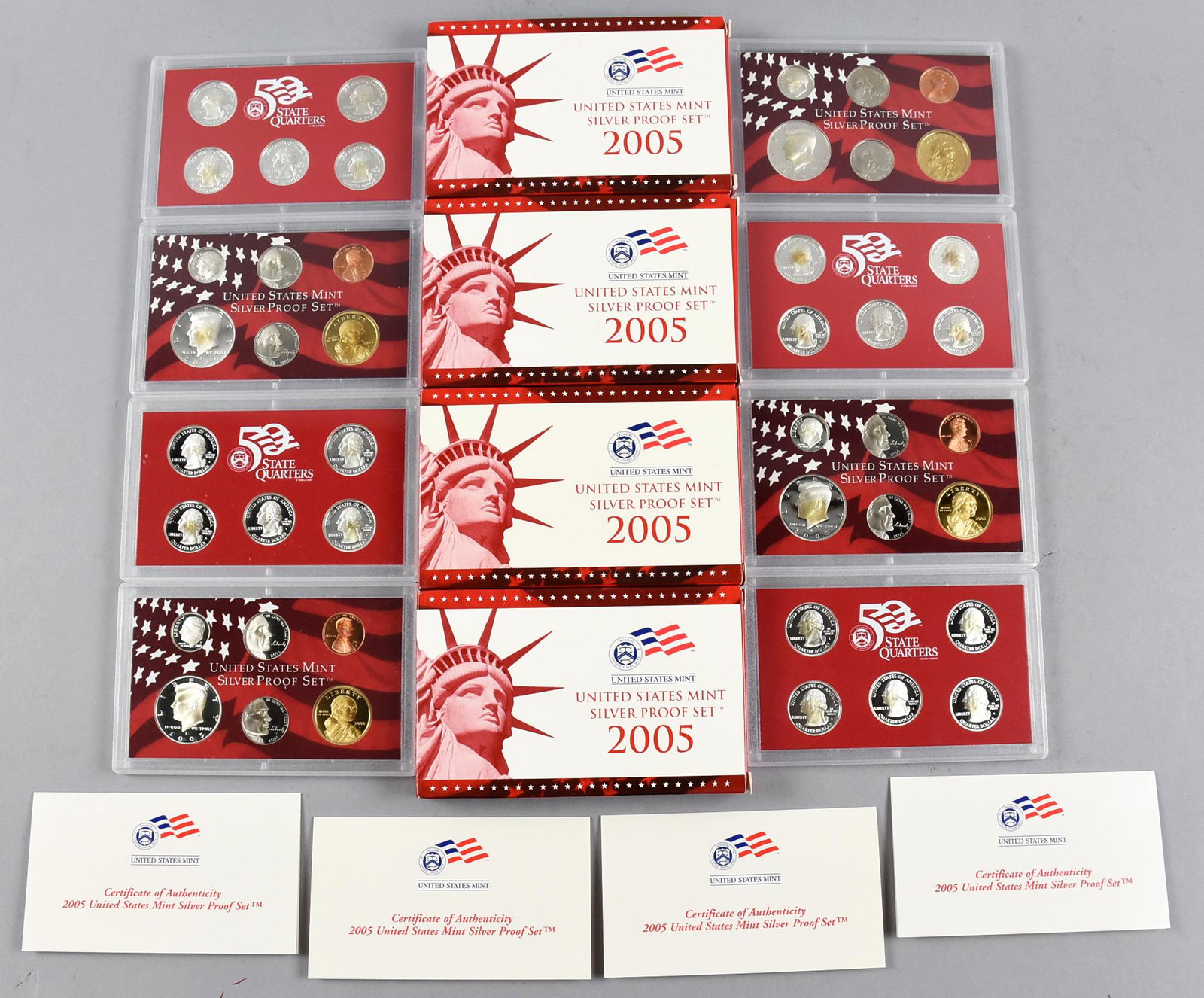 Lot of 4 2005 United States Mint Silver Proof Sets: Lot of 4 2005 United States Mint Silver Proof Sets. Each set includes 2 distinct sets encased by the U.S. mint. One set includes a Sacagawea dollar, Kennedy silver half dollar, a Roosevelt silver dime