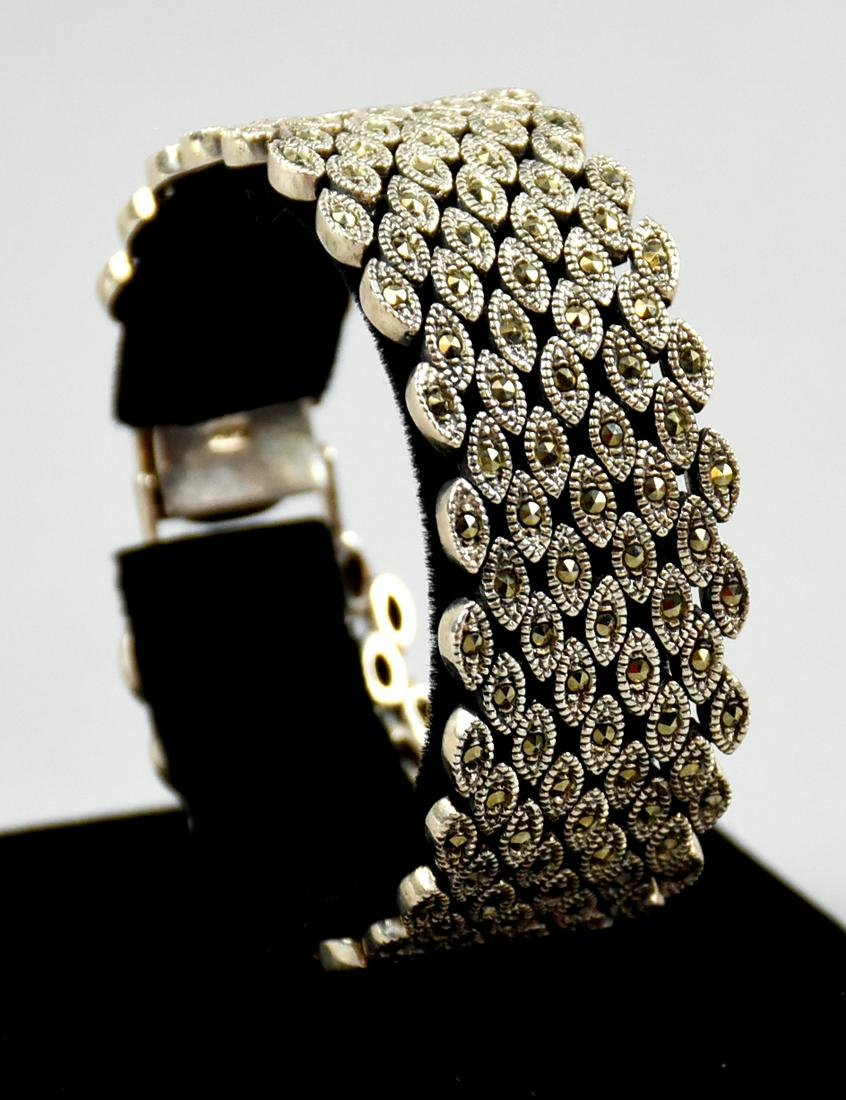 Gorgeous Hava Sterling & Marcasite Bracelet: Stunning is the best for this bracelet by Hava. It is sterling silver with inlayed marcasites all the way through. It is stamped 925 and measures approx 7 1/2" x 3/4".