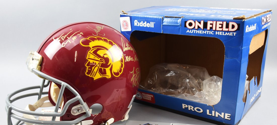 USC Trojan Full Helmet Signed Bush Davis White: This full size Riddell helmet from the USC Trojans was signed by several players. Anthony Davis, Reggie Bush, Matt Leinart, Charles White and more. Helmet is in good condition with signatures clear.