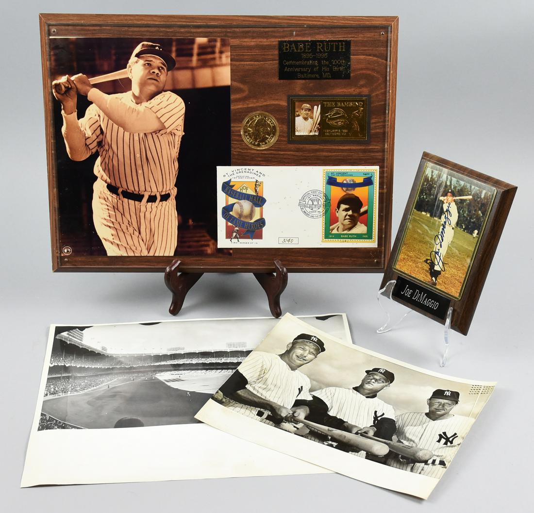 Vintage NY Yankees Memorabilia: This fun lot comes with four items, a Joe DiMaggio signed photo on a small plaque with the photo being under lucite. A Baseball Hall of Fame Heroes first day cover featuring Babe Ruth. A sepia toned B
