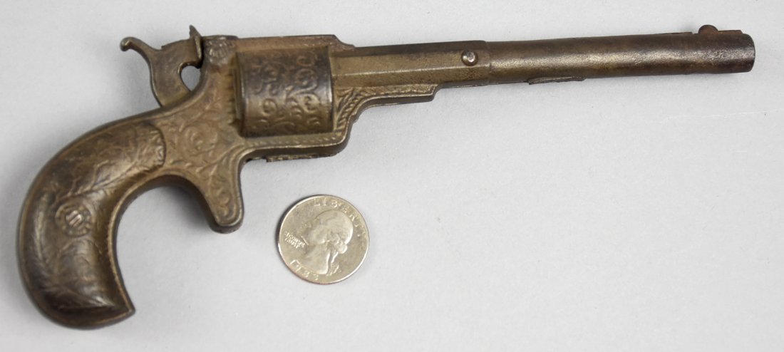 Antique J&E Stevens Cast Iron Cap Gun: With the hidden trigger and overall design, this toy cap gun appears to be by J&E Stevens. There are no markings and toy is fully functioning with good spring and nice trigger action. Measures approx