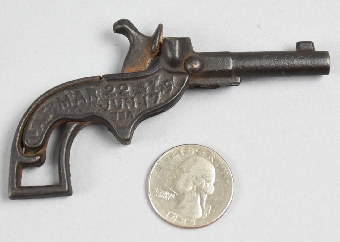c1890 J&E Stevens Acorn Cap Gun: Sweet little cast iron cap gun is from J&E Stevens and is the ACORN model. Marked on one side with the model number, on the other two patent dates, March 22 & June 17, 90. Hammer cocks nicely, trigger