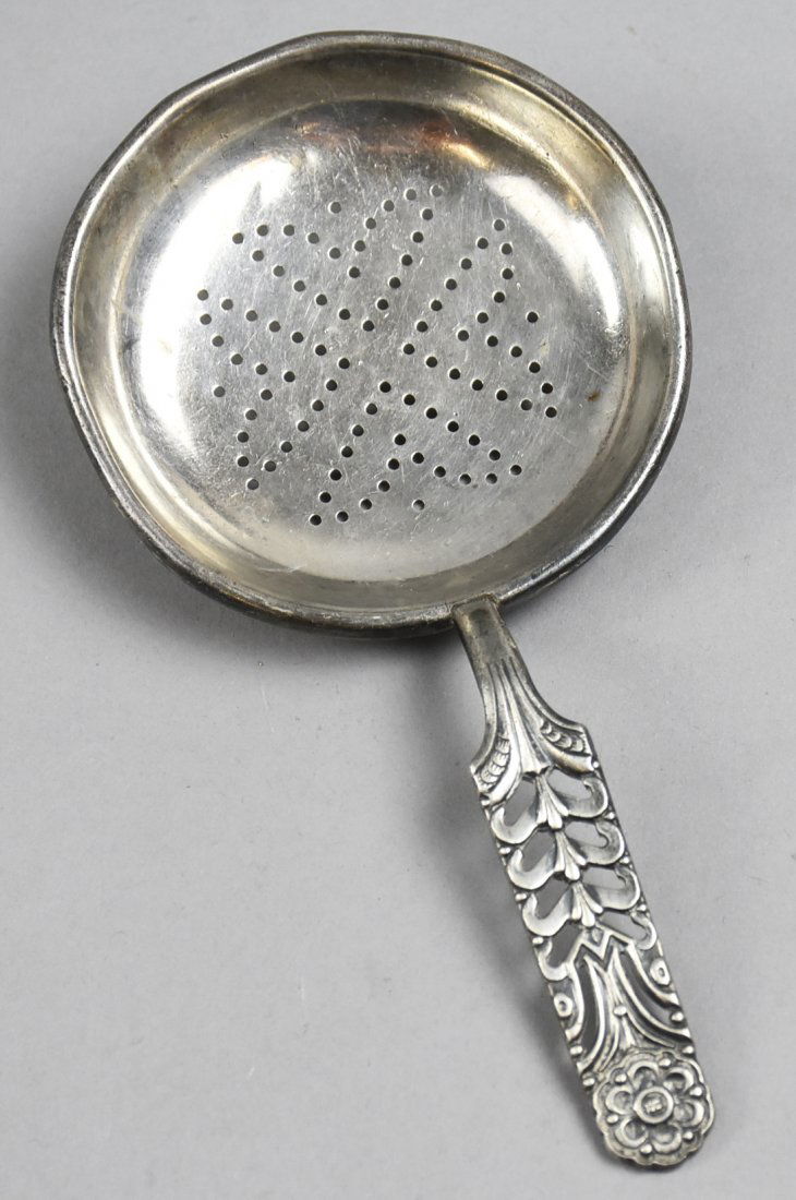 Vintage David Anderson, Norway, Sterling Tea Diffuser: Lovely sterling silver tea diffuser by David Anderson, Norway. It is marked on the back D.A. 925S and has a pierced handle with flower rosette on the end. Approx overall weight 46.93g and measures app