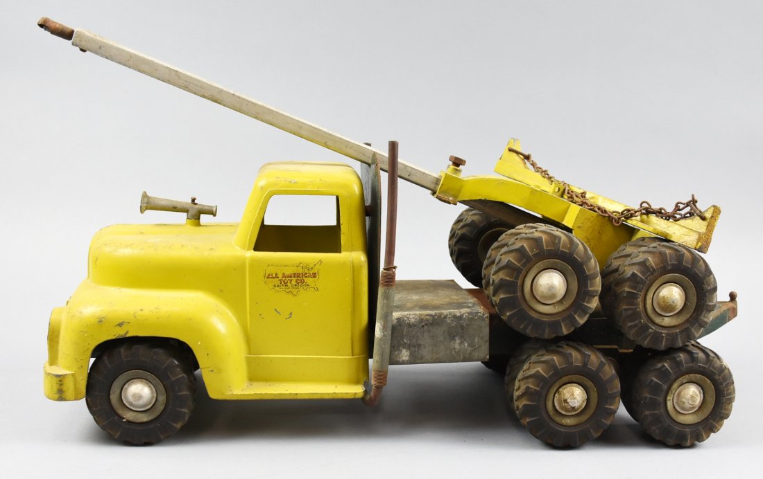 Vintage All American Toy Co, Timber Toter: This Timber Toter is from the All American Toy Co and is from the 1950s. Appears to be all original and the two pieces measure approx combined 38"