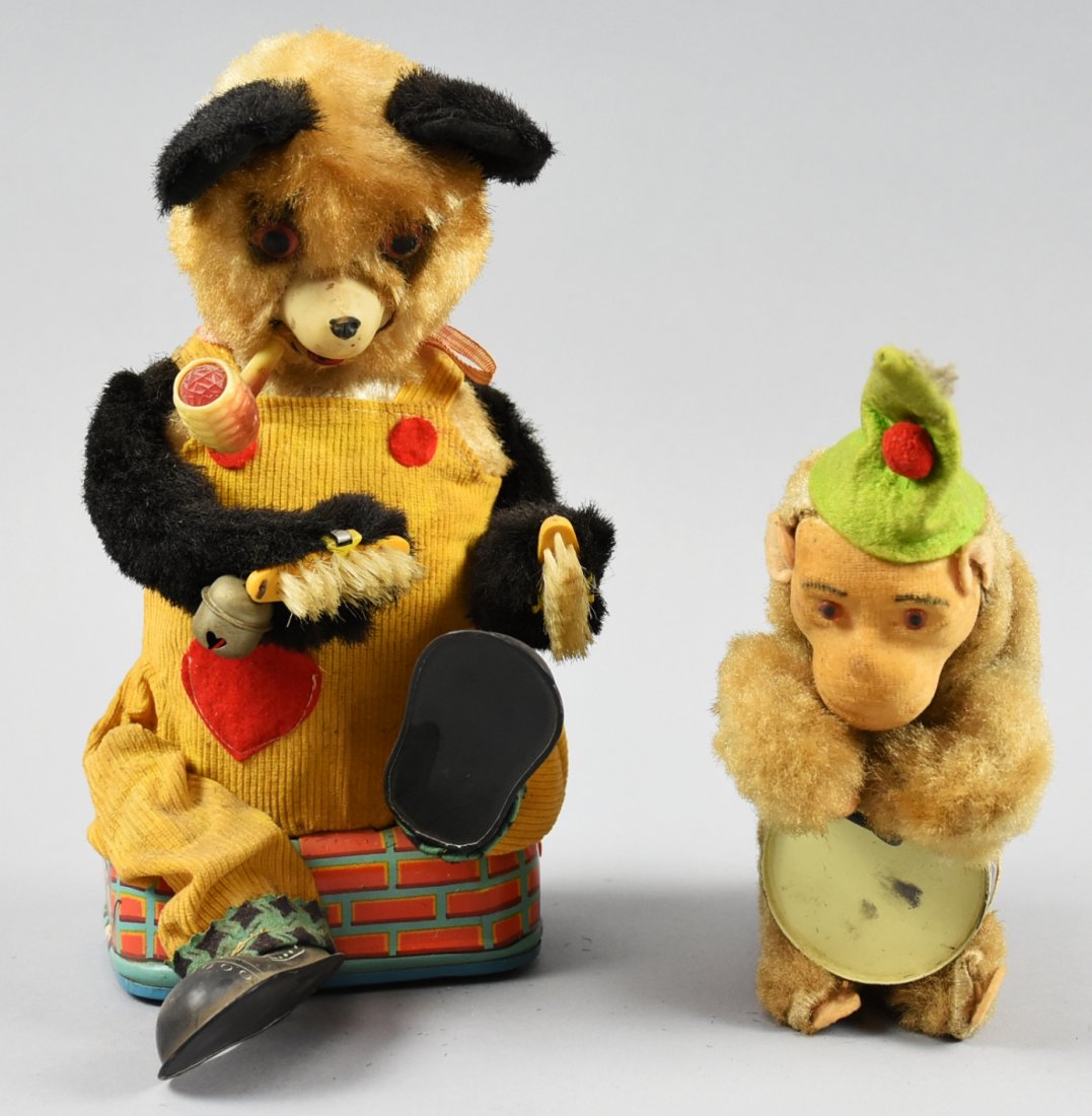 Vintage German/Japan Mechanical Toys: These little cuties are vintage mechanical toys. The monkey is faux fur with a felt hat, he has his original paper tag on his neck. He does wind, but does not drum and shows general wear to to his fur