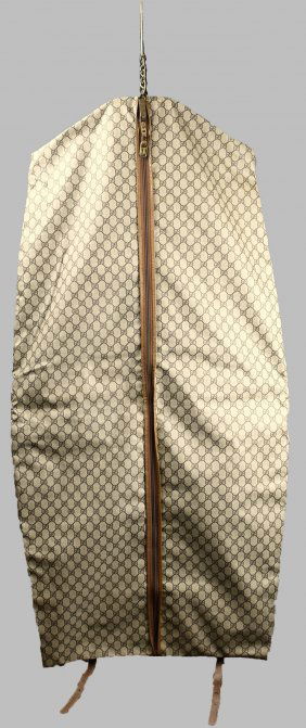 Vintage Monogram GUCCI Garment Bag: This great vintage style GUCCI garment bag has been gently used and This coated canvas bag does not have a label that I can find. Approx measurements 50" x 24". Comes with original receipt that was fo