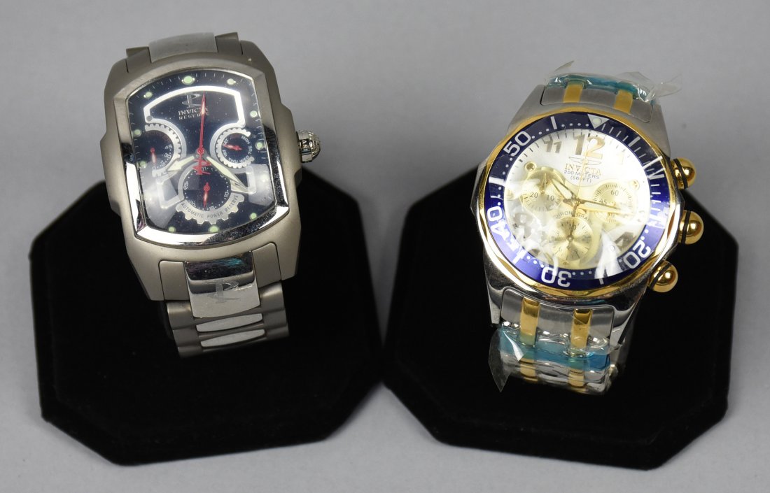 PAIR Invicta Lupah, No. 5757/3215: Both watches appear unused, no. 5757 has slight cloudiness to face, 3215 has much of original factory protective wrap on the band.