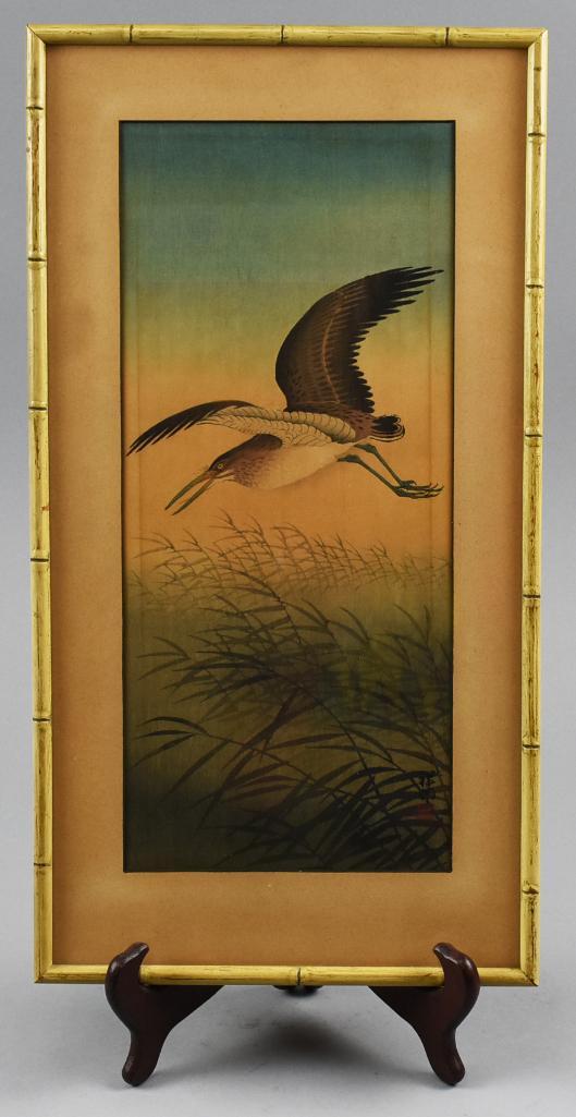 Ohara Koson (1877-1945) Woodblock Print: This c1930 print is by artist Ohara Koson and is called Night Heron in Reeds. The artist and publisher marks are hidden in the reeds, lower right. The frame appears to be faux bamboo with tan matt