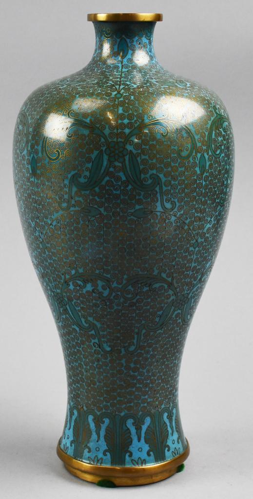 Tall Japanese Cloisonné Vase: Very nice Japanese cloisonne vase with two different shades of turquoise. The details are floral with scrolls throughout in a very Art Nouveau style. Stands approx 11" tall.