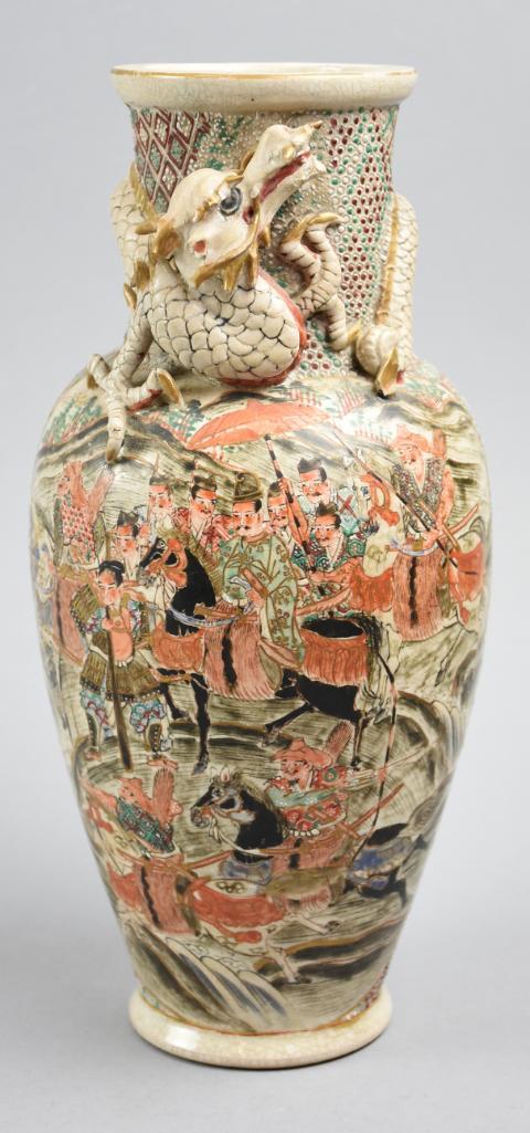 Antique Japanese Satsuma Dragon Vase: Lovely Satsuma vase with a molded dragon wrapped around the neck and a busy scene painted throughout. There appears to be a mark on the bottom but cannot be well seen under the crackle glaze. Stan