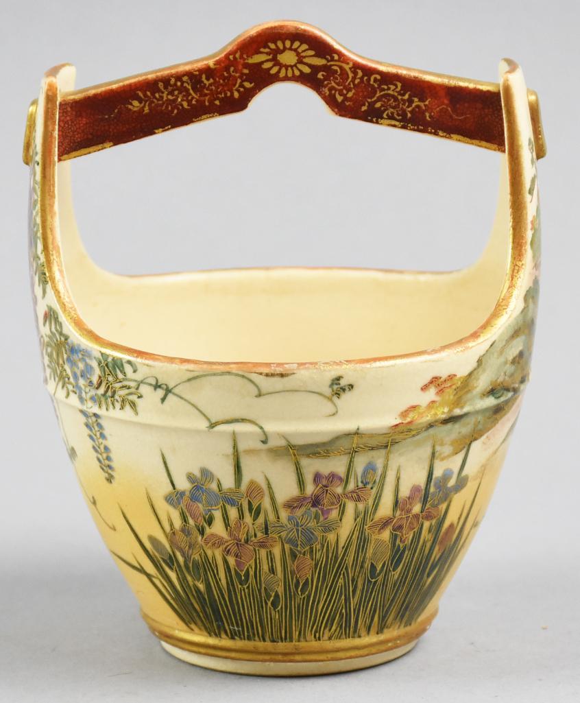 Satsuma Wisteria Flower Basket Signed Dozan: Satsuma Wisteria flower basket, with wisteria on one side, and lillies on the other. Has a scene of a cottage on one side of the "handles". Signed, Dozan. Has some very minor wear to the gold gilt. Ot