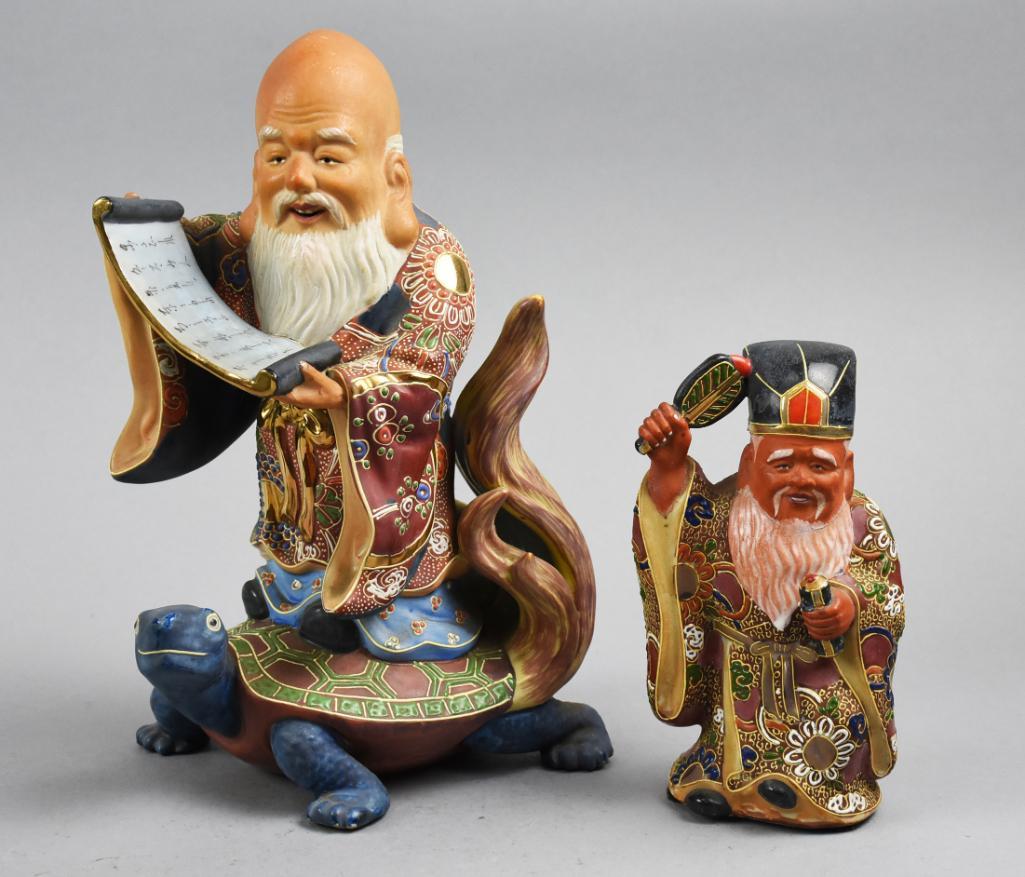 Satsuma Moriage Pottery Figures Signed: Two Japanes Moriage Pottery Figues. Both appear to be artist signed, Kutani. Larger is 9.5 inches tall. Smaller is 6 inche tall. Both Appear in excellent condition.