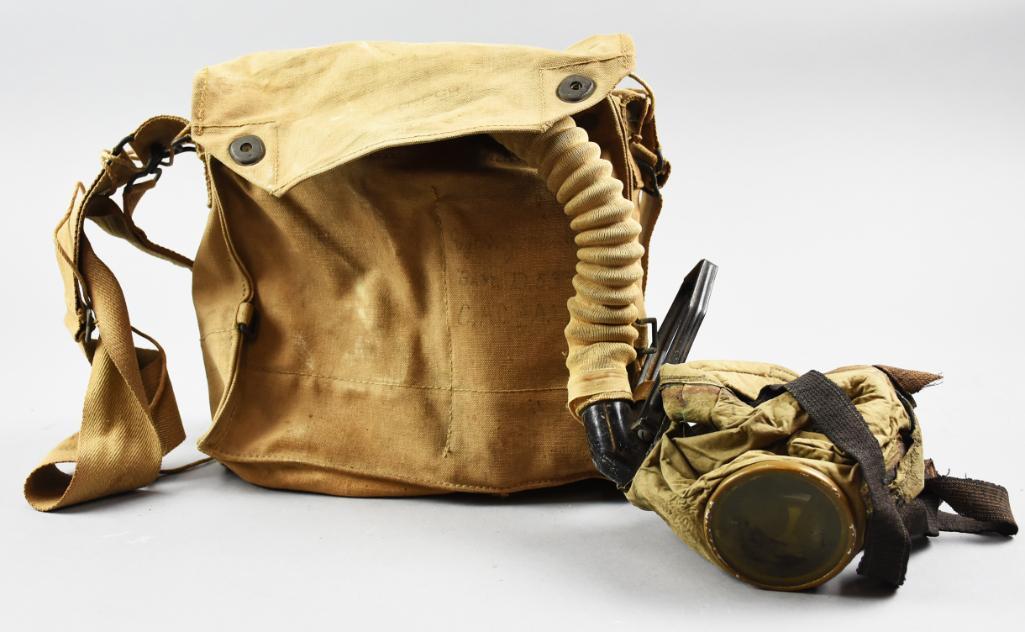 WWI CAC AEF Gas Mask w/ Canister/Canvas Pouch: WWI canvas pouch with gas mask and canister belonged to who appears to be Sgt W.J. Kennedy, CAC, AEF 53rd Battalion. The last name is faded. The kit is complete and is number P-18-832-1290 and 185