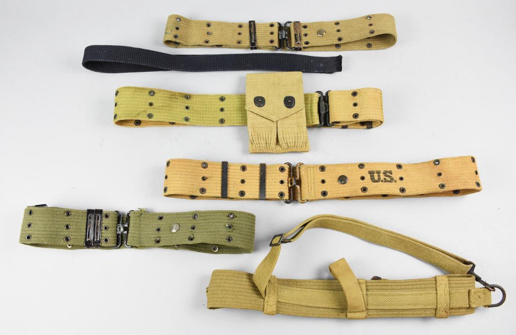 5 WW2 Military Pistol Belts: 5 assorted military pistol belts and 1 uniform belt. I believe these are all WW2 belts.