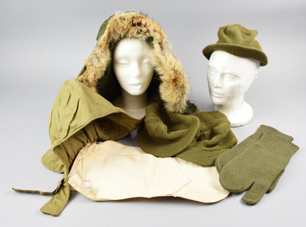 Assort. Lot of Cold Weather Gear Military: Lot consists of 1 pair of wool gloves, 1 pair of mitten inserts, 3 wool caps, 1 insulated helmet insert and 1 fur lined parka hood.