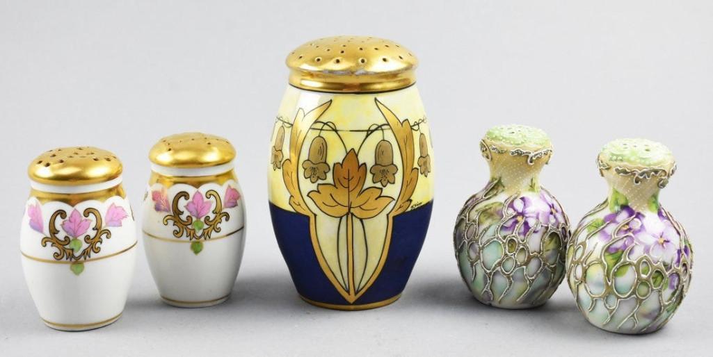 (3) Porcelain Shakers, Royal Nippon, WA Packard: Description These wonderful porcelain pieces are all in shaker form. One unsigned sugar shaker with Art Deco details, yellow luster with blue and heavy gold paint, signed by artist; unsigned Royal Nip