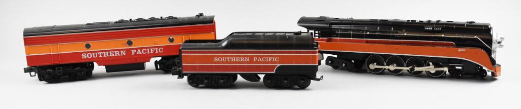 Williams Southern Pacific Locomotive w/ Coal Tender &: Nice three piece lot of Williams Southern Pacific trains. The locomotive still retains warning hang tag and appears to have never been used and includes the coal tender. The Pullman car is very nice w