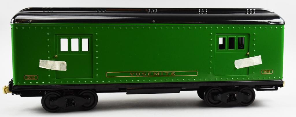 T-Reproductions Buddy L, Train Baggage Car #2012: This nice T-Reproduction, Buddy L train car is the Baggage Car, no. 2012. It appears to have never been removed from the box when it arrived to us, removed here for photos only. The gauge is 2.75" or 