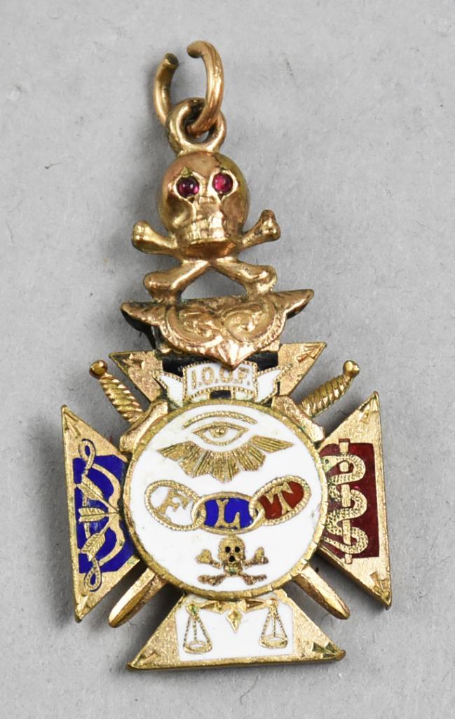 Independent Order of Odd Fellows 10k PendantFob: Very cool fob that could be used as a pendant for the Independent Order of Odd Fellows. The pendant or fob is enameled in red, white and blue with skull and crossbones, with the skull having what appe