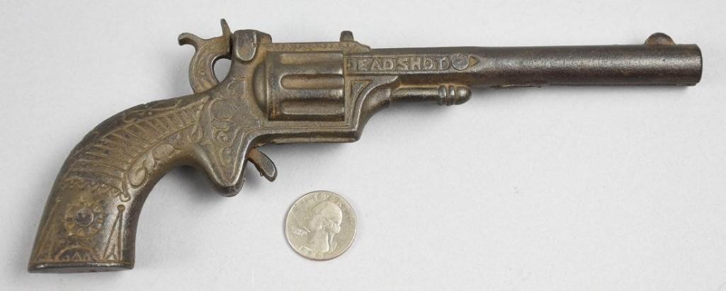 c1890 J&E Stevens Dead Shot Cap Gun: The Dead Shot J&E Stevens cast iron cap gun is a rare one and doesn't come on the market often. This toy is in the style of a revolver with a hidden trigger until the hammer is cocke