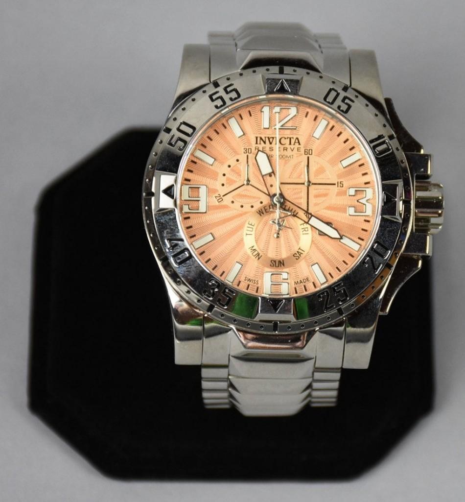 Invicta Excursion, No. 15299: Appears unused, retains some original factory plastic around the band.