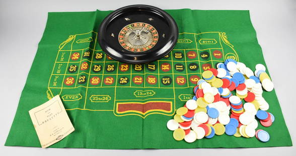 c1940 E.S. Lowe Roulette Game: Vintage E.S. Lowe (USA) roulette game, includes roulette wheel, roulette ball, chips, layout and original instruction pamphlet. Wheel turns very well and easy to play.