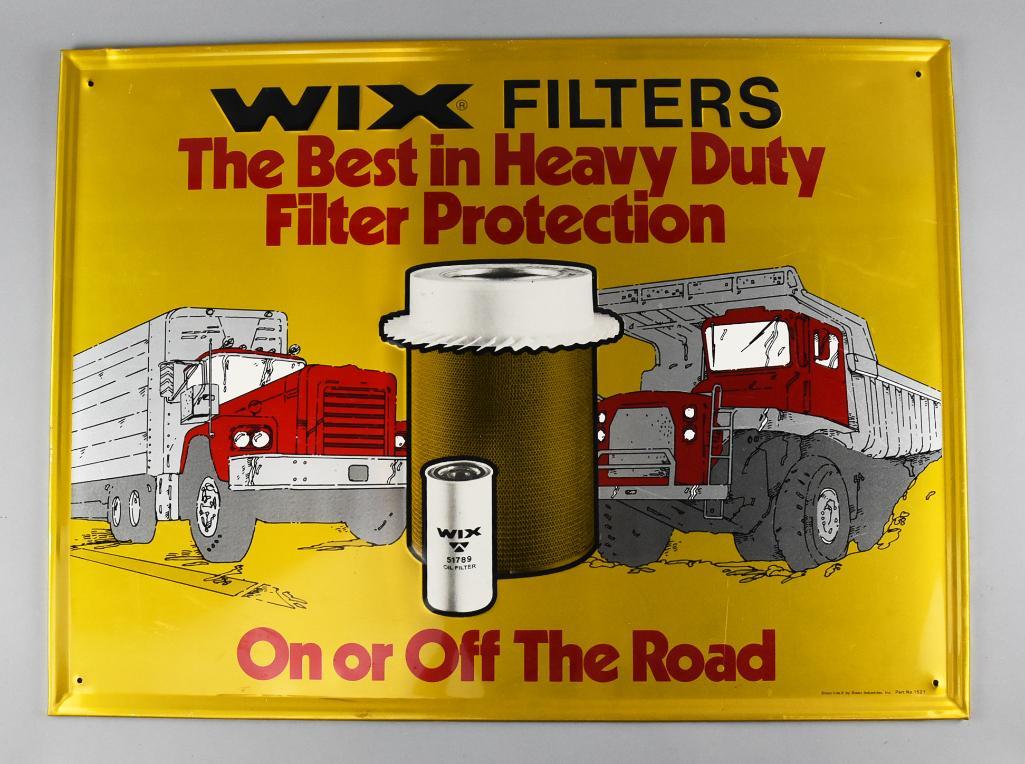 Vintage Stout Industries Wix Filters Metal Sign: Very cool retro sign for Wix Filters. Nice graphics depicting work trucks with the filter in the center. Made by Stout-Lite Stout Industries and measures 23.5" x 31.5". Signs like these are ha