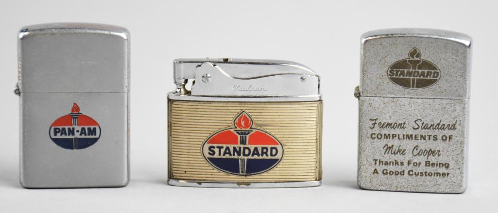 (3) Vintage Standard Oil Advertising Lighters: All three of these lighters have the Standard Oil logo with one for Pan-Am and one for Fremont Standard.