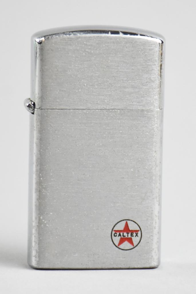 Vintage Caltex Texaco Lighter by Penguin: Nice Zippo style lighter by Penguin. Advertising for Caltex Texaco.