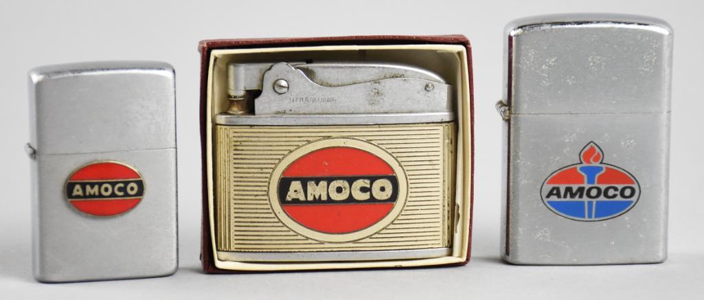 (3) Vintage Amoco Advertising Lighters: These nice lighters are all advertising for Amoco now known as BP. Lighters are Little Billboard with original box, Barlow and Dundee Bantam.